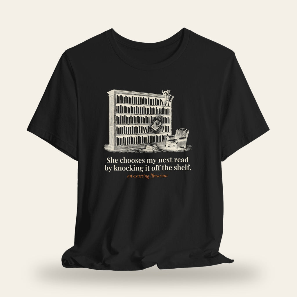 She Chooses My Next Read by Knocking It Off the Shelf T-Shirt